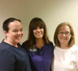 Mountain View Clinic HR Manager Deb English (right) values the dedication to success shown by CLIMB graduates Elizabeth (left) and Candie (center) have found success
